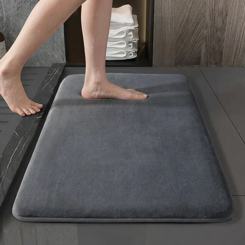 Tapis de bain séchage rapide absorbant et antidérapant, idéal pour garder votre salle de bain propre, confortable et sécurisée.