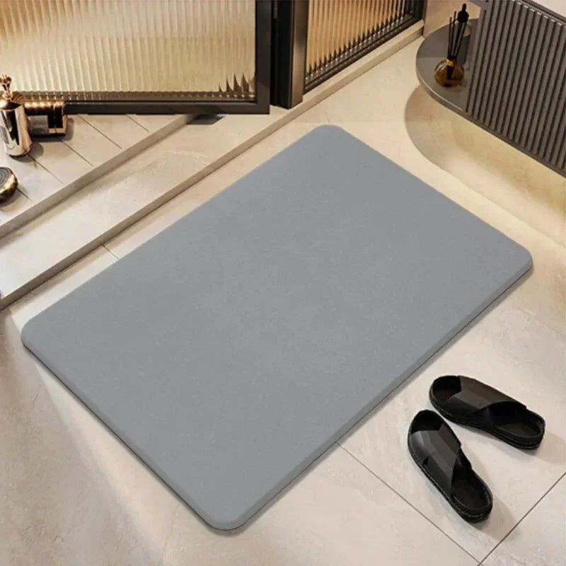 Tapis de bain ultra absorbant et antidérapant, séchage rapide, idéal pour garder votre salle de bain propre et sécurisée au quotidien.